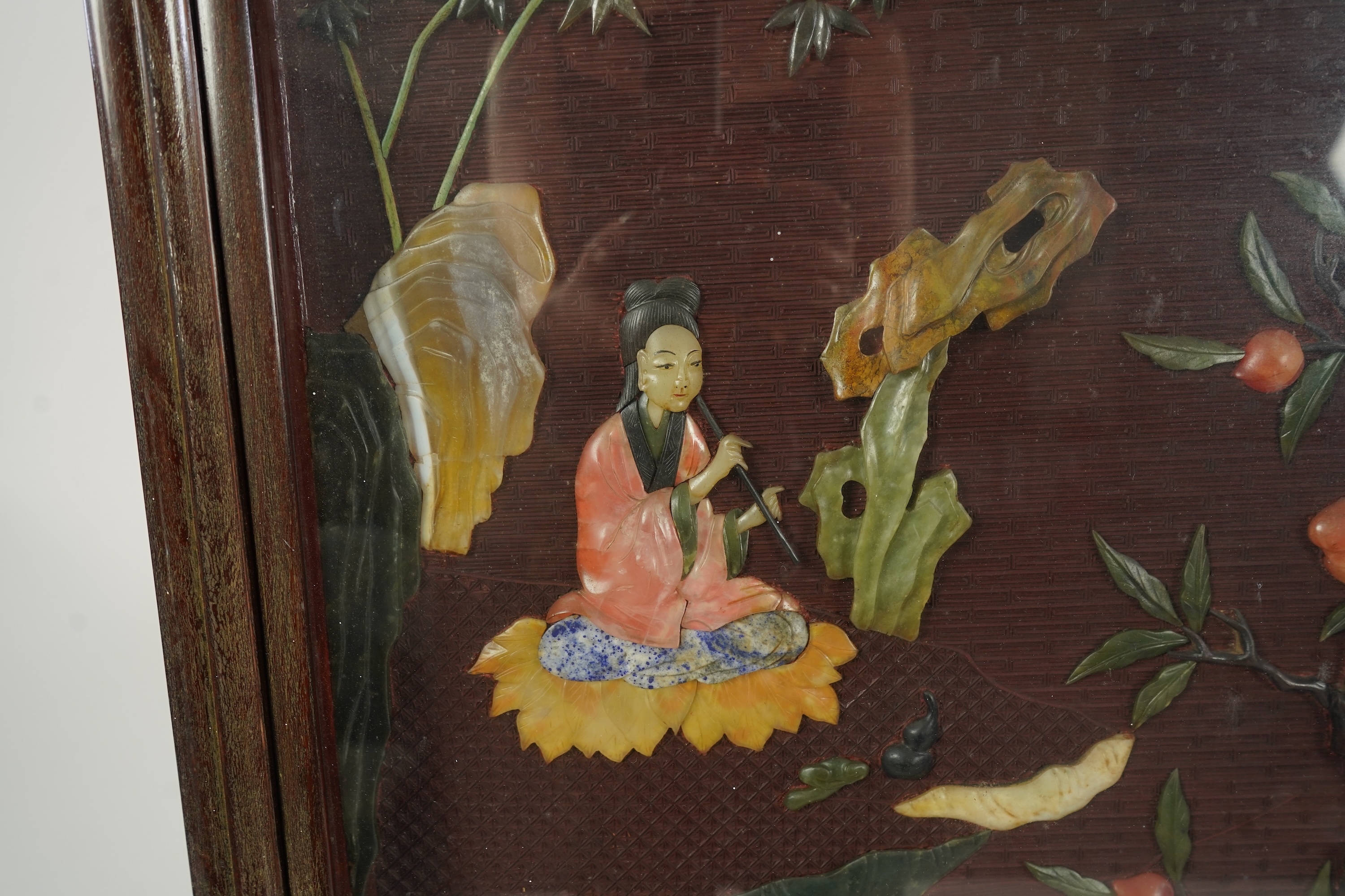 A Chinese carved cinnabar lacquer and hardstone mounted panel, early 20th century